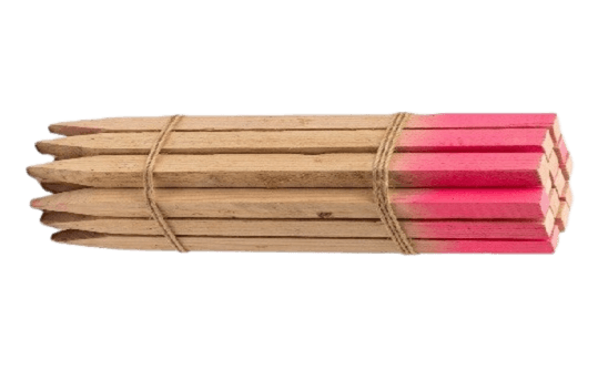 Bundle of wooden survey stakes with pink-dipped ends